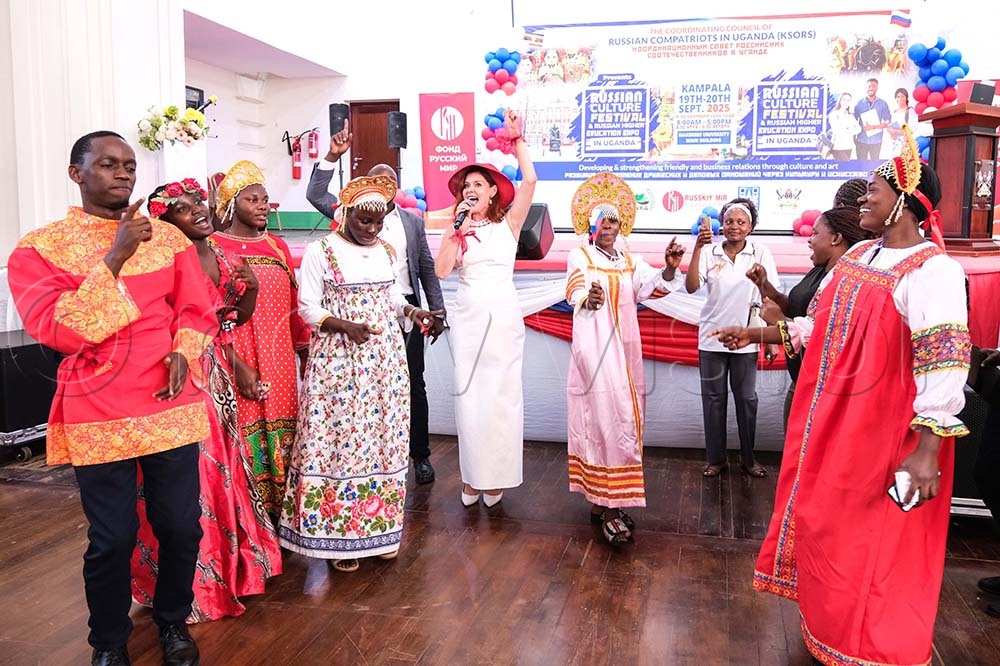 Natalya Lakova, a Russian musician, performs modern Russian music as people dance along during the Russian Festival at Makerere University, on September 19 2025. (Credit: Hajarah Nalwadda)