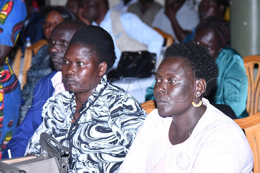 Participants follow the proceedings