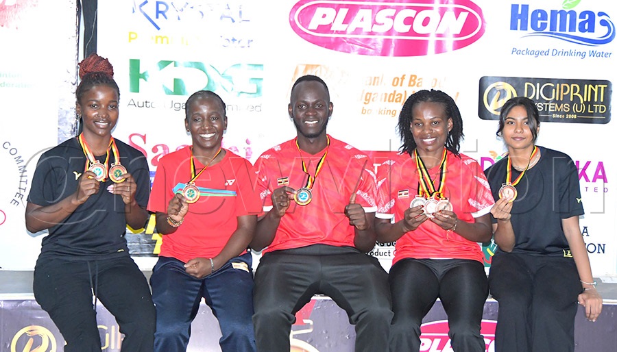 The Ugandan players who won medals at the 2026 Uganda International Badminton Tournament. From left are Tracy Naluwooza, Mable Namakoye, Muzafar Lubega, Gladys Mbabazi and Fadilah Shamika. Photo: Silvano Kibuuka