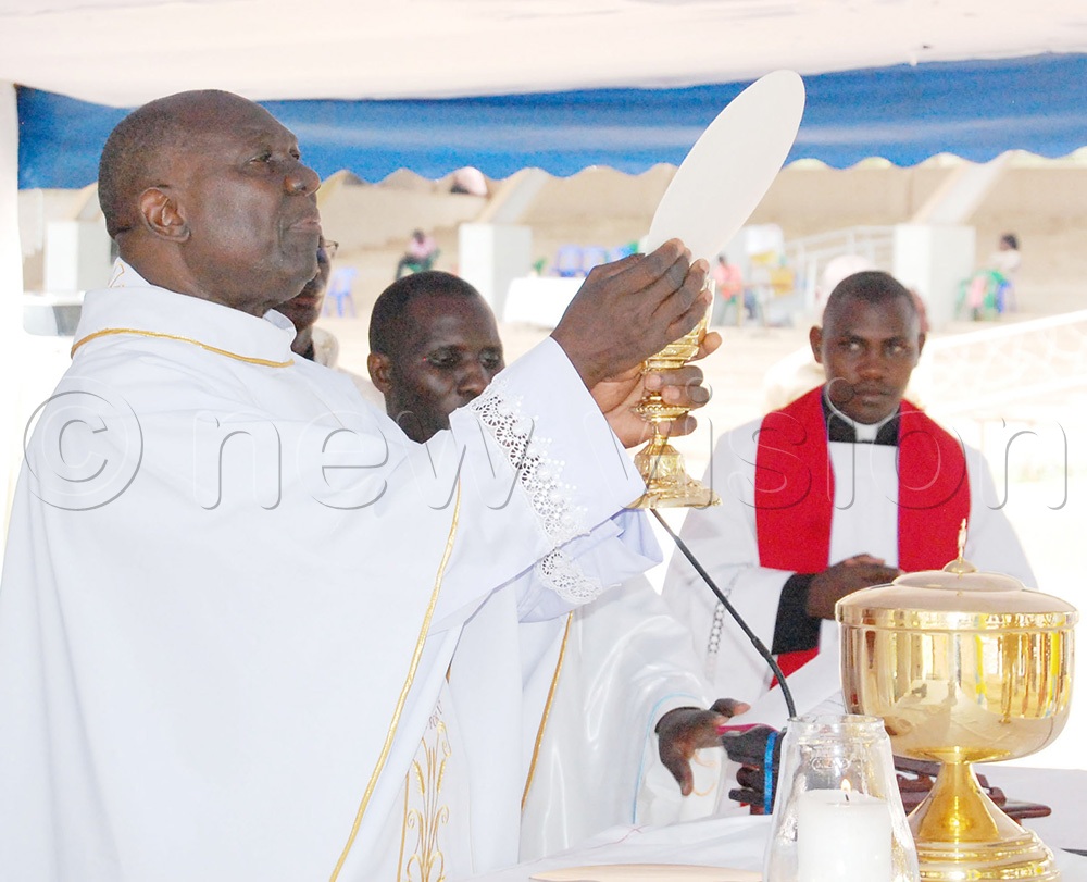 Msgr. Dr. Lawrence Ssemusu celebrating the thanksgiving mass for the commemoration of the International day of the family at Uganda Martyrs Catholic Shrine Namugongo on May 16. (Photo by Mathias Mazinga)