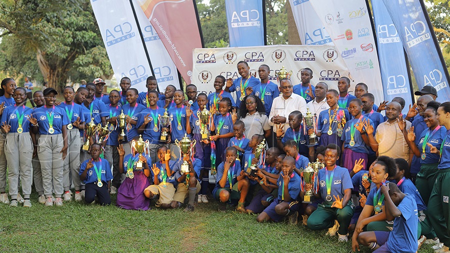 Winners of the 16th edition of the ICPAU Junior Tournament pose for a photo with their trophies and medals, alongside officials from the sponsors and Uganda Woodball Federation President Paul Mark Kayongo at Kyambogo. &mdash; Photo by Johnson Were