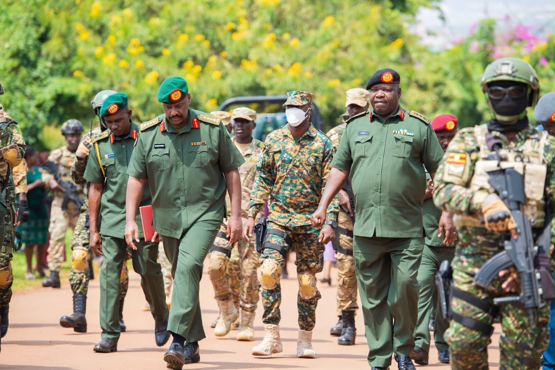 CDF Gen Muhoozi Kainerugaba and Deputy CDF Lt Gen Samuel Okiding during the retirement ceremony for 222 senior officers held at the UPDF Joint Services Headquarters in Mbuya on August 12, 2026. (Courtesy)