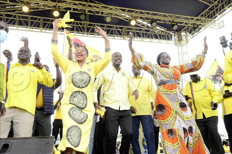 The Speaker of Parliament, Annet Anita Among and other leaders dancing on stage.