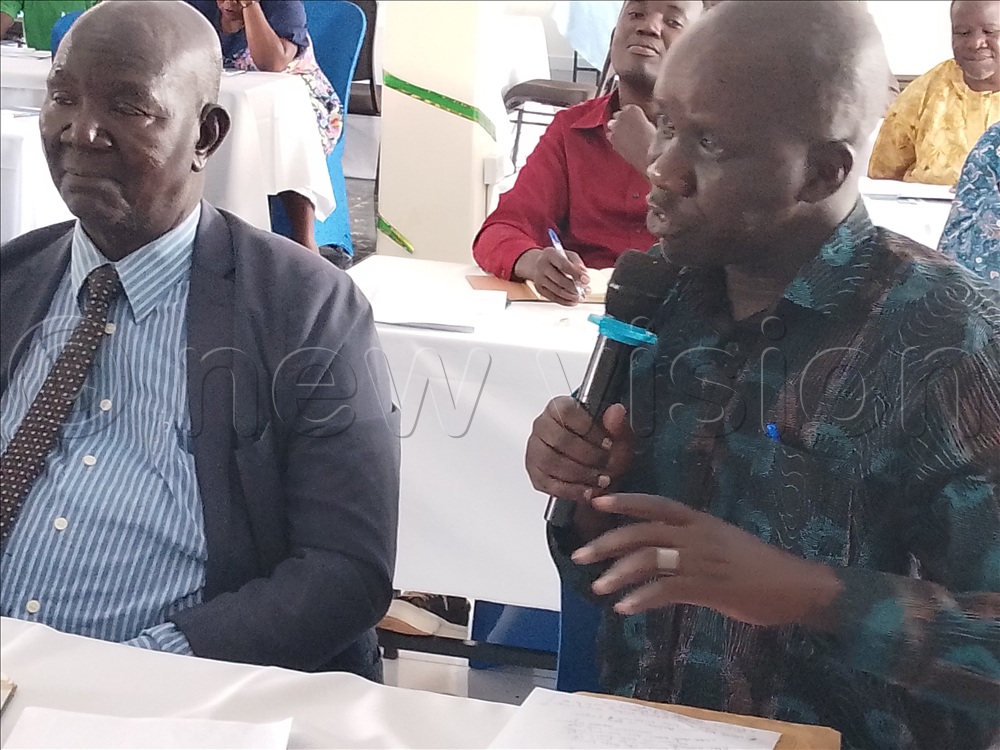 Dr Ocen giving his views at the dialogue at Gracious Palace Hotel in Lira City. (Photo by  Patrick Okino)&nbsp;