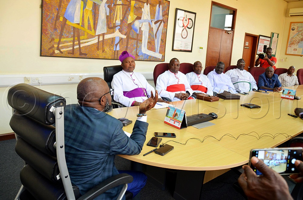 Vision Group CEO Don Wanyama in a meeting with Mukono Diocese Bishop Rt. Rev. Enos Kitto Kagodo and other clerics during their visit. (Photo by Isaac Nuwagaba)