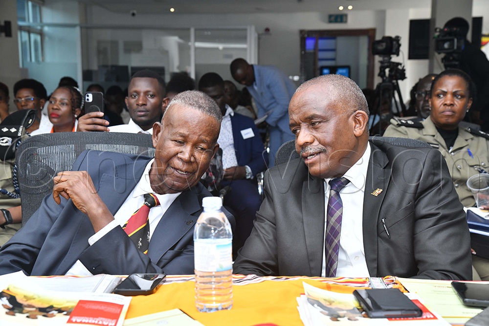 Minister of Internal Affairs Prof. Ephraim Kamuntu and Permanent Secretary Lt. Gen. Joseph Musanyufu during the national commemoration event of the World Day Against Trafficking in Persons. (Photo by Richard Sanya)
