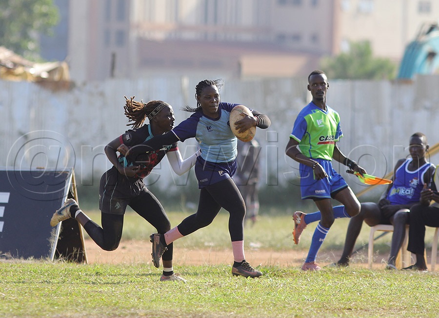 Thunderbirds' Grace Nabaggala is tackled by a Nile Rapids player during the Lawii Rwodi Rugby 7s final in Gulu. The Rapids emerged 12–7 winners. PHOTO: Johnson Were