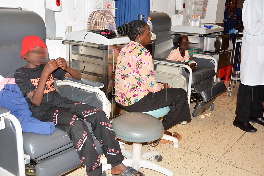 Children with cancer at their ward in Mulago Hospital. The children received assortment of nutrition items donated by Old Budonians Club, American Tower of Corporation and Jesa farm. (Photo by Francis Emorut)