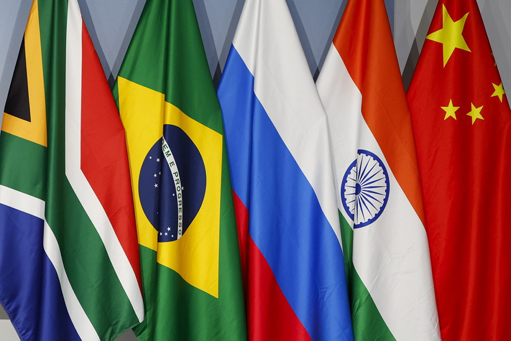 A general view of flags of (From L to R) South Africa, Brazil, Russia, India and China during the 2023 BRICS Summit at the Sandton Convention Centre in Johannesburg on August 24, 2023. - The BRICS countries, an acronym of the five members Brazil, Russia, India, China and South Africa, meet for three days for a summit in Johannesburg. 