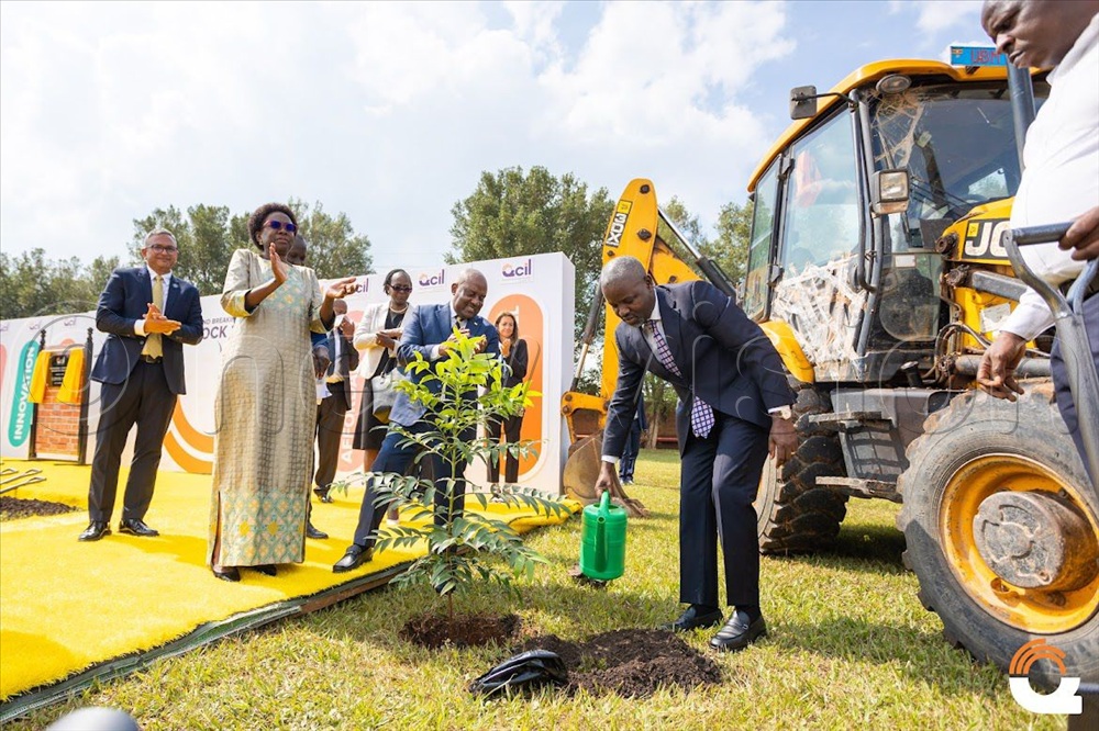 Deputy speaker Thomas Tayebwa plants a treee in commemoration of the 20 years.