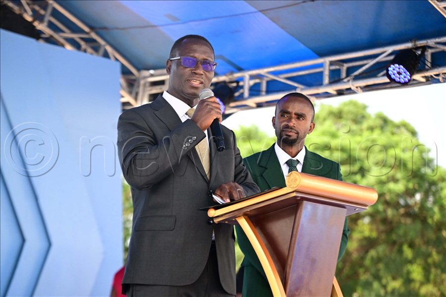 Aggrey David Kibenge Permanent Secretary Ministry of Gender, Labour and Social Development delivers the president&rsquo;s message as MD Youth Platform Africa Obed Ben listens. This was at the celebration of 18 years of YPA at Kololo independence Grounds on May 22, 2026. (All Photos by Maria Wamala)