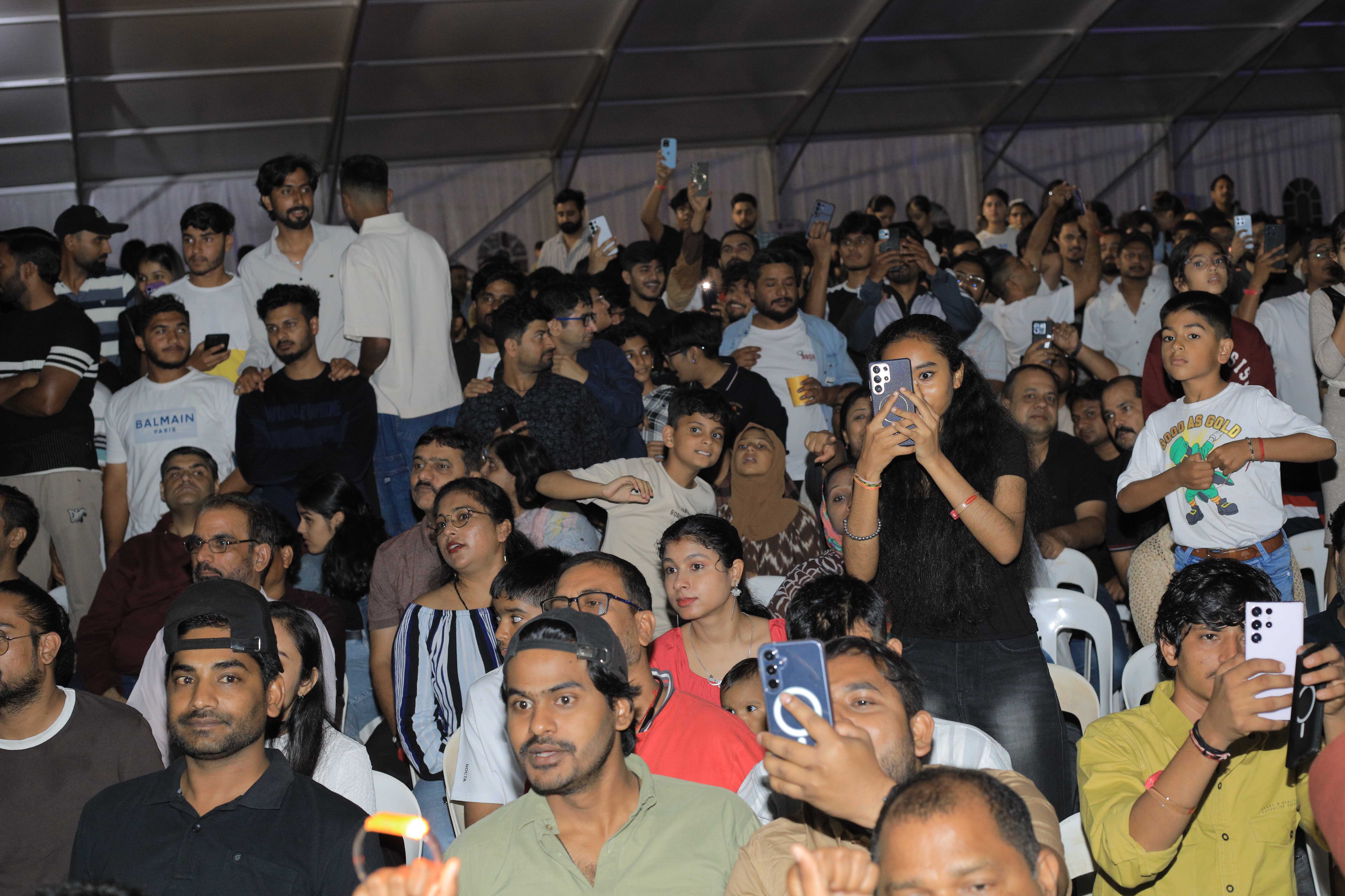 The full-house crowd cheered on the performers. Photo by David Lukiiza