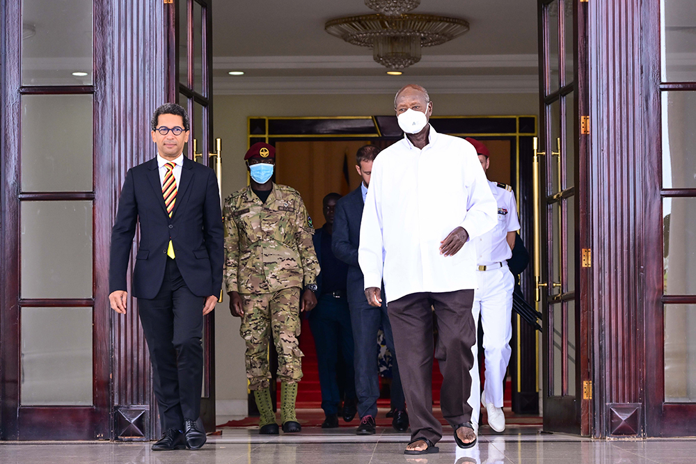 President Museveni shares a light moment with outgoing French Ambassador to Uganda Xavier Sticker after a meeting at State House Entebbe on Tuesday. 