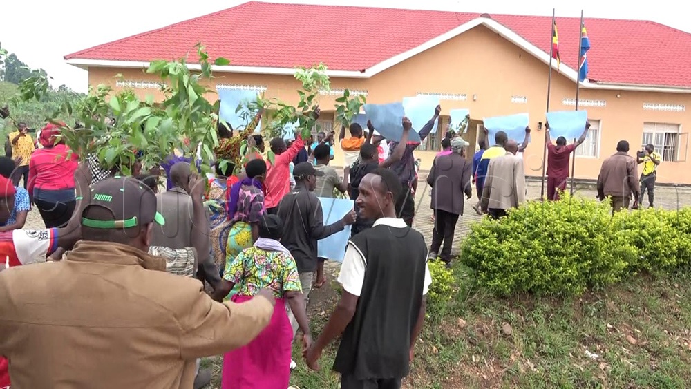 The chaos reportedly stemmed from disagreements over the voters' register, with some residents claiming their names had been removed. Police fired rubber bullets to disperse the rowdy crowd before election officials abandoned the exercise. (Credit: Bruno Mugizi)