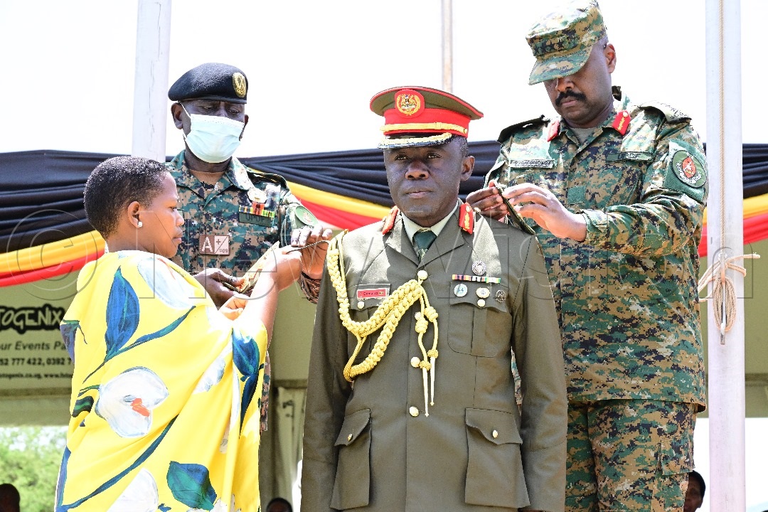 Maj. Gen. Christopher Damulira decorated by the CDF Gen. Muhoozi Kainerugaba together with Mrs Damulira. (Credit: Mpalanyi Ssentongo)