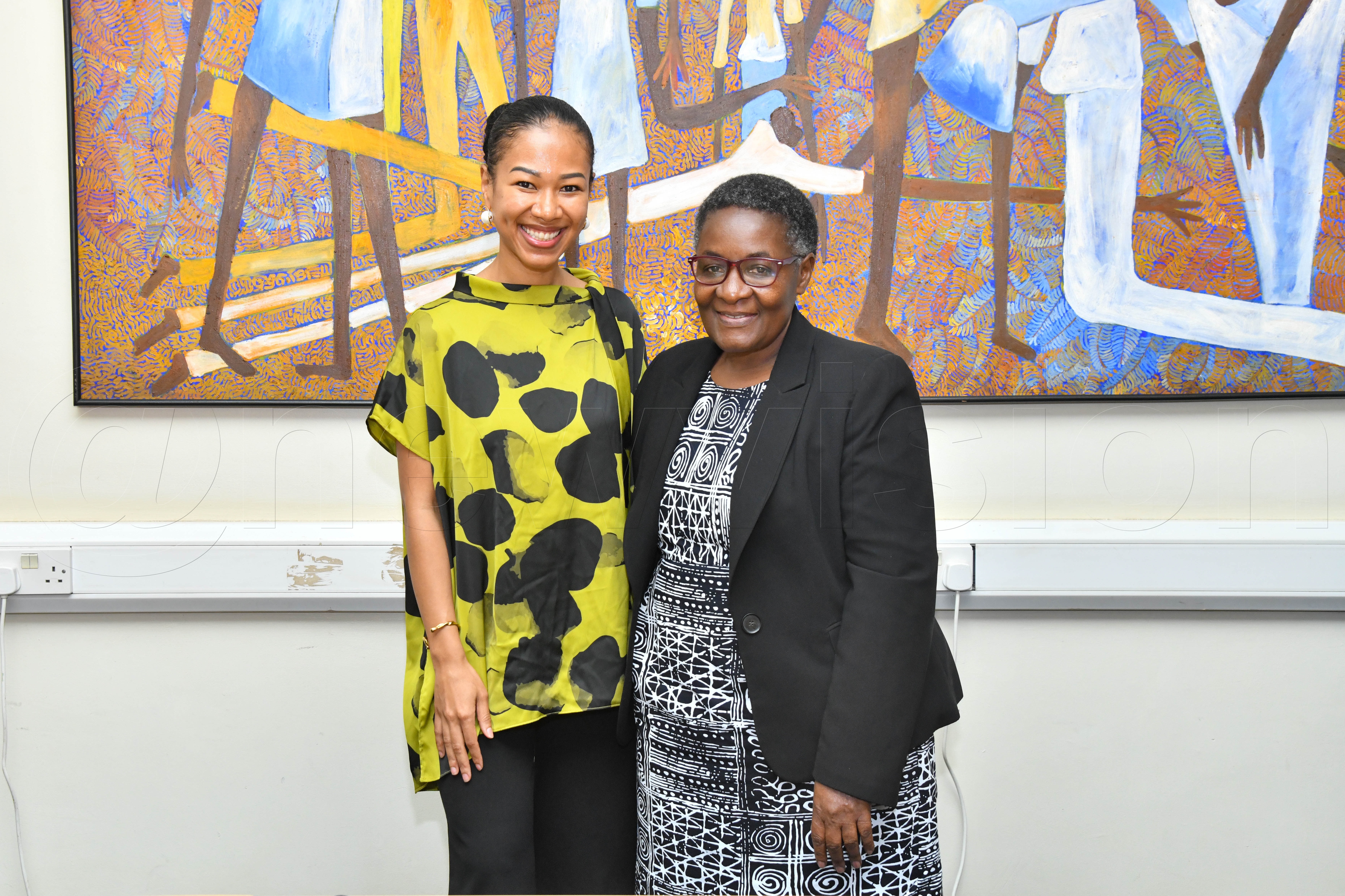 Huawei Technologies Spokesperson Sooma Mukyala Fouziya and outgoing Vision Group Editor-in-Chief Barbara Kaija pose for a photo during a courtesy farewell visit at the Vision Group headquarters in Kampala.