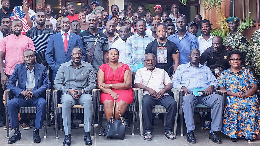 Seated from the left is Sula Kamoga, UBF president Moses Muhangi, MJoureen Mulangira the head of UBF Professional boxing Lincesing Committe, Don King Samuel Lukanga, Simon Barigo and Rose Kabwama (right) during an extra ordinary UBF assembly recently. PHOTO: Fred Kisekka