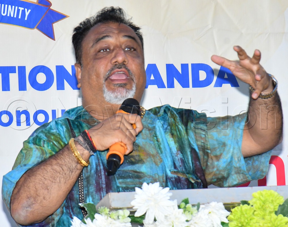 The Minister of Trade, Industry and Cooperatives, Sanjay Tanna, addresses members of the Indian business community at City Point Resto in Jinja City on June 28. (Photo by Donald Kiirya)