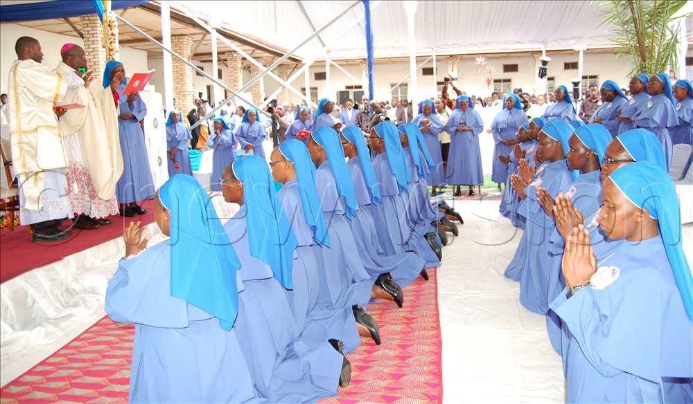 Bishop Serverus Jjumba (wearing a skull-cap) prays a blessing on the 19 Sisters of the Catholic Religious Institute of the Daughters of Mary who took their perpetual vows during their function at  Bwanda Convent, in  Kalungu district on Thursday, January 8, 2026.  