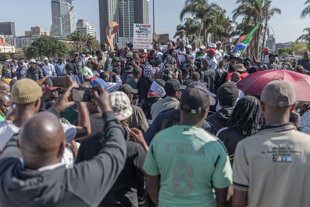 March and March Movement members protest outside the Durban International Convention Centre (ICC) under the theme "It’s Time to Fetch Your People" while the 46th Southern African Development Community (SADC) Summit is underway in Durban, on August 17, 2026. The Movement called on regional African heads of states to prepare what it describes as the mass deportation of undocumented foreign nationals from South Africa by September 30 2026. (AFP)