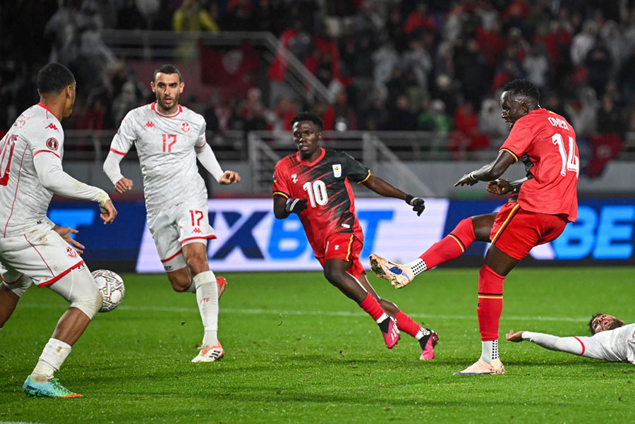 Uganda's forward #14 Denis Omedi scores a goal during the Africa Cup of Nations (CAN) Group C football match between Tunisia and Uganda at Rabat Olympic Stadium in Rabat. AFP PHOTO