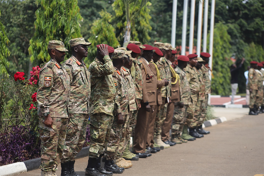 SFC soldiers saluting during the retirement ceremony at the SFC Headquarters in Entebbe. (Credit: SFC)