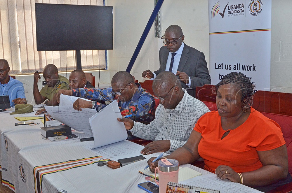 The Electoral Commission Acting Secretary, Richard Baabo Kamugisha (seated 3rd right) with representatives of nominated Presidential candidates Cross-checking proposed campaign schedules during a meeting to harmonise their campaign programmes ahead of the official campaign period. This was at the EC’s offices in Kampala on Friday, September 26, 2025. (Photo by Emmanuel Ssekaggo)