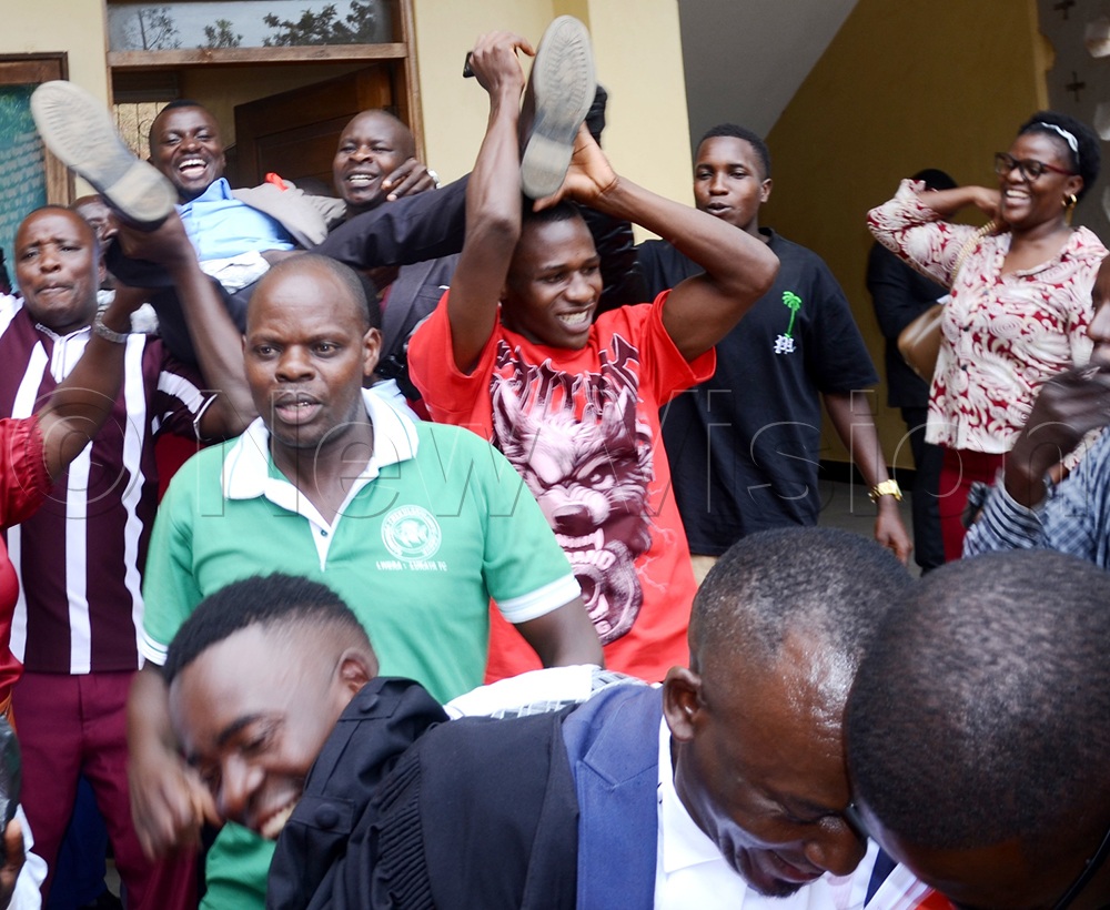 Kalungu East MP, Yusuf Nkeretanyi being carried by his joyful supporters after the court ruling. (Credit: Dismus Buregyeya)