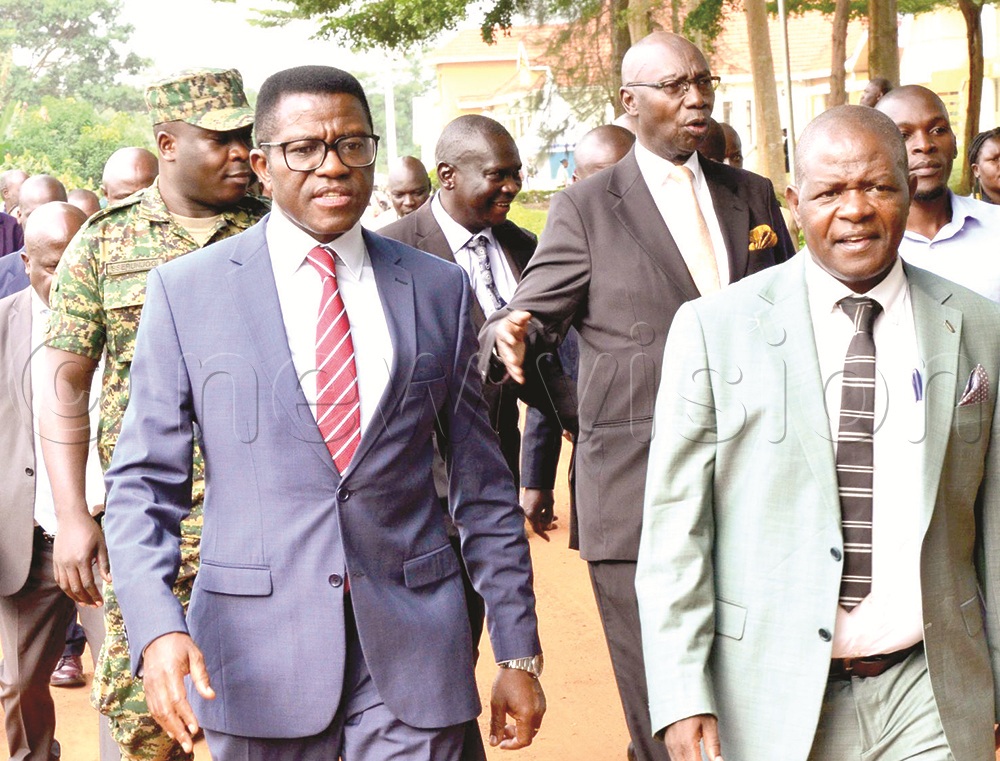 Buganda Kingdom Katikirro Charles Peter Mayiga with Arinaitwe during a coffee engagement recently.