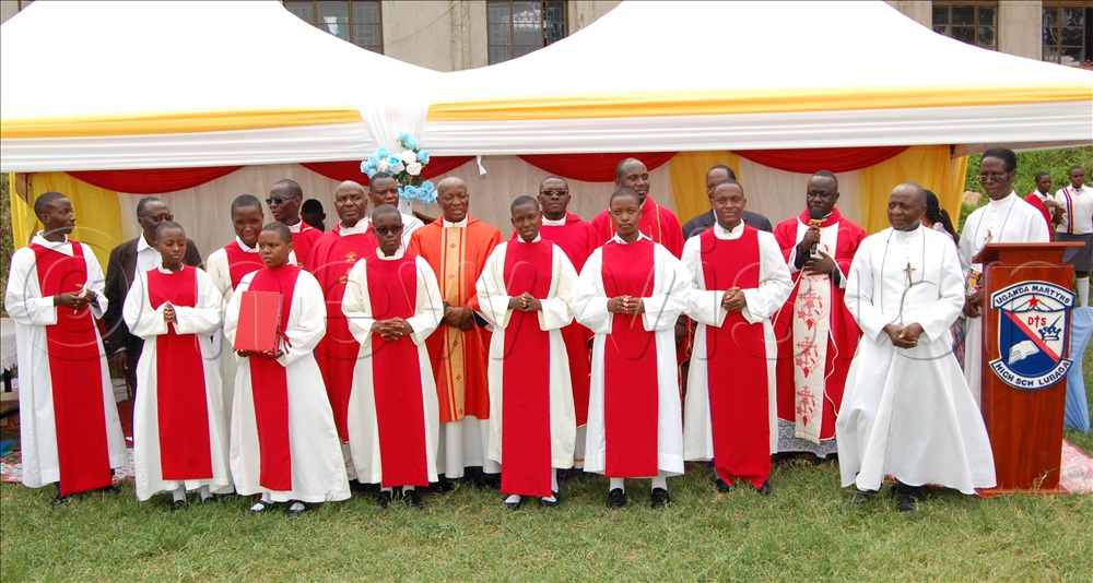 The mass servers sharing a photo-moment with the concelebrants after mass.