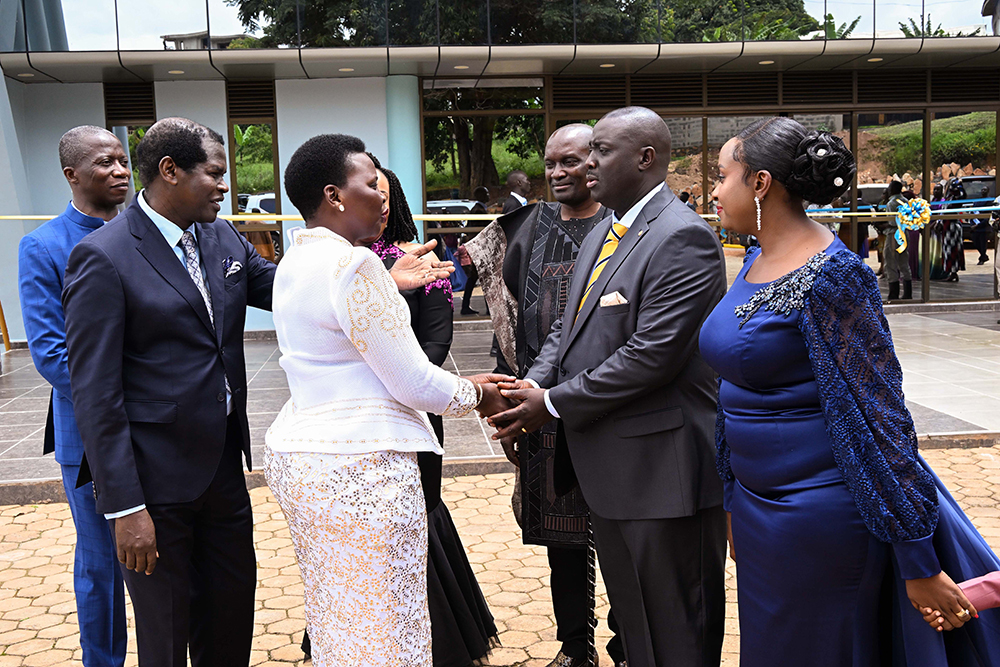 Pastor Kenneth Kato of Life Restoration Ministries and his wife Oliver (R) welcoming Hon. Beatrice Akello, State Minister for Economic Monitoring for the commissioning of the church at Bujuko as Pastor Robert. (PPU)