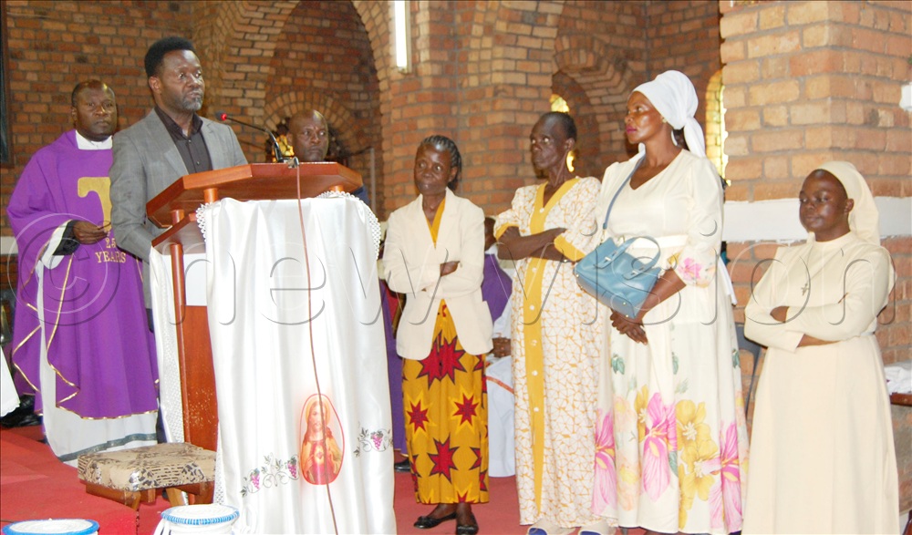 Lwanga Henry Ssempijja (behind microphone) eulogises his mother, Lady Nalugwa Veronica Nalumanya Lwanga,  during the requiem mass at St. Peter's Proto-Cathedral Nsambya on Thursday, February 5, 2026. Standing besides him are his siblings. 