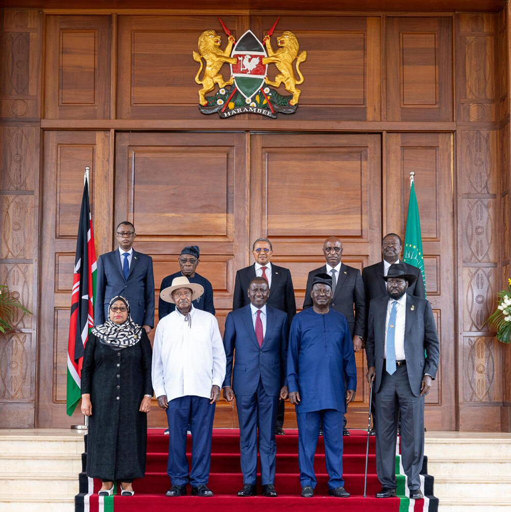 Raila Odinga poses for a photo with President William Ruto, Yoweri Museveni, Salva Kiir, Samia Suluhu and other regional leaders during the launch of his African Union Commission chairmanship bid on August 27, 2024.