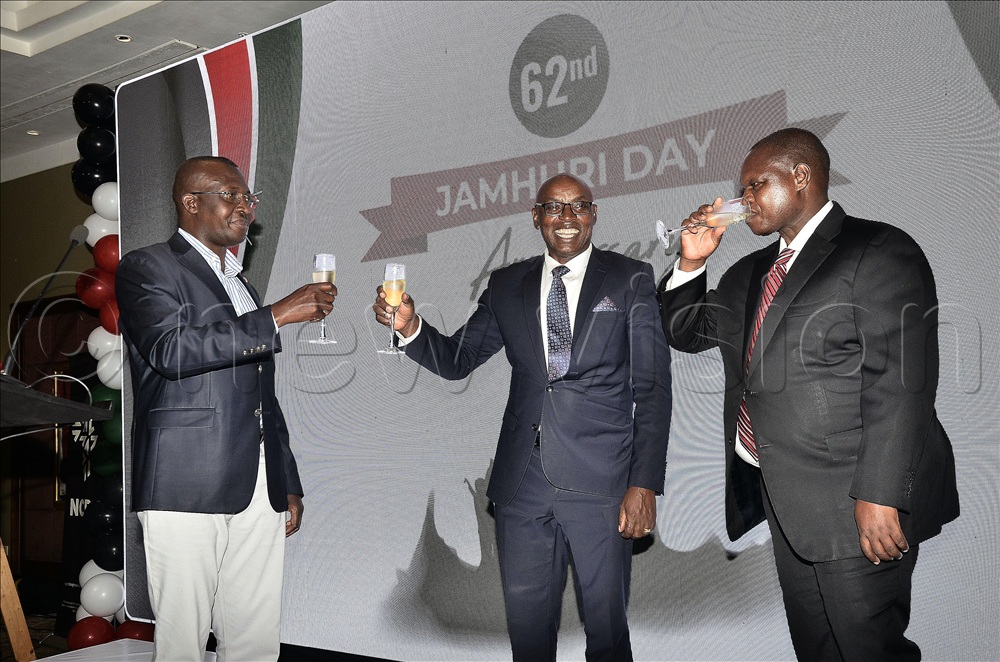 (L-R) John Muliba, State Minister for Regional Cooperations, Flavian Zeija, Deputy Chief Justice and Joash Mangi, Kenya High Commissioner toasting to commemorate the 62nd Independence Day for Kenya at Sheraton Hotel in Kampala.