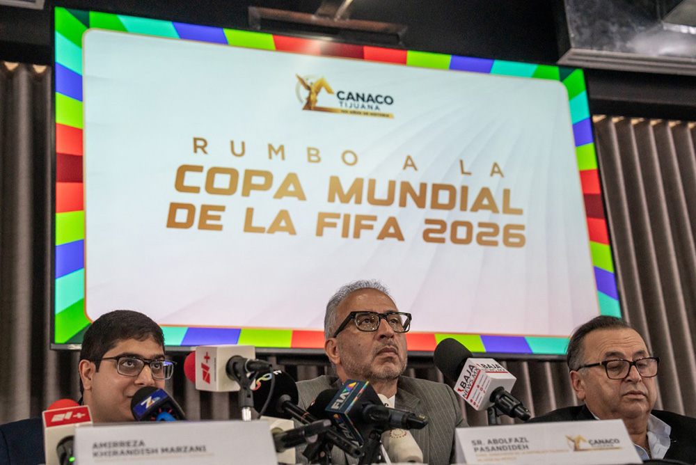 Iran's ambassador to Mexico Abolfazl Pasandideh (C) gestures during a press conference ahead of the arrival of the national football team for the FIFA 2026 World Cup football tournament, in Tijuana, Baja California, Mexico on June 6, 2026, Iran lashed out at the United States for refusing visas to some of its squad support staff as the players were to leave Turkey for Mexico, just days before the June 11 start of the 2026 World Cup, which is being jointly hosted by the United States, Mexico and Canada. (Photo by Chris Noyola / AFP)