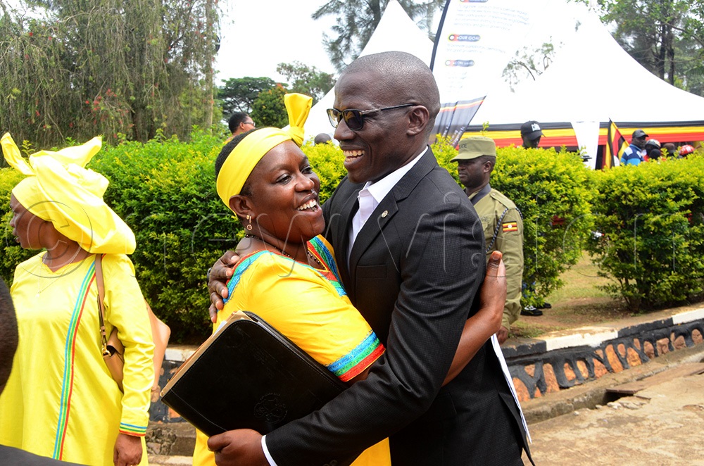 Mbarara City woman MP, Rita Bwahika Atukwasa being congratulated by her husband, Chrysostom upon her nomination at EC offices in Booma , Mbarara City. She is contesting as Independent NRM leaning. (Photo by Fred Turyakira)