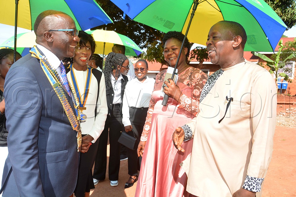 Rotary International District 9214 (Uganda and Tanzania) District Governor Daniel Mukasa Ddamulira (left) and Impact President of the Rotary Club of Akright City Ann Kawooya Nsubuga (second left) interact with Headteacher Claire Khainza (second right) and Rotarian Peace Taremwa (right) during a visit to St Padre Pio Kabulamuliro Primary School in Bwebajja, Wakiso District, on Sunday, September 27, 2026. (Photo by Francis Emorut).
