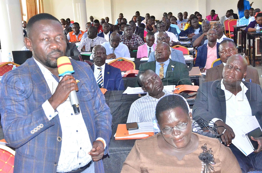 Odongo making a contribution during the consultative meeting at Margaritha Palace Hotel in Lira City on Monday. (Credit: Joseph Ekol)    