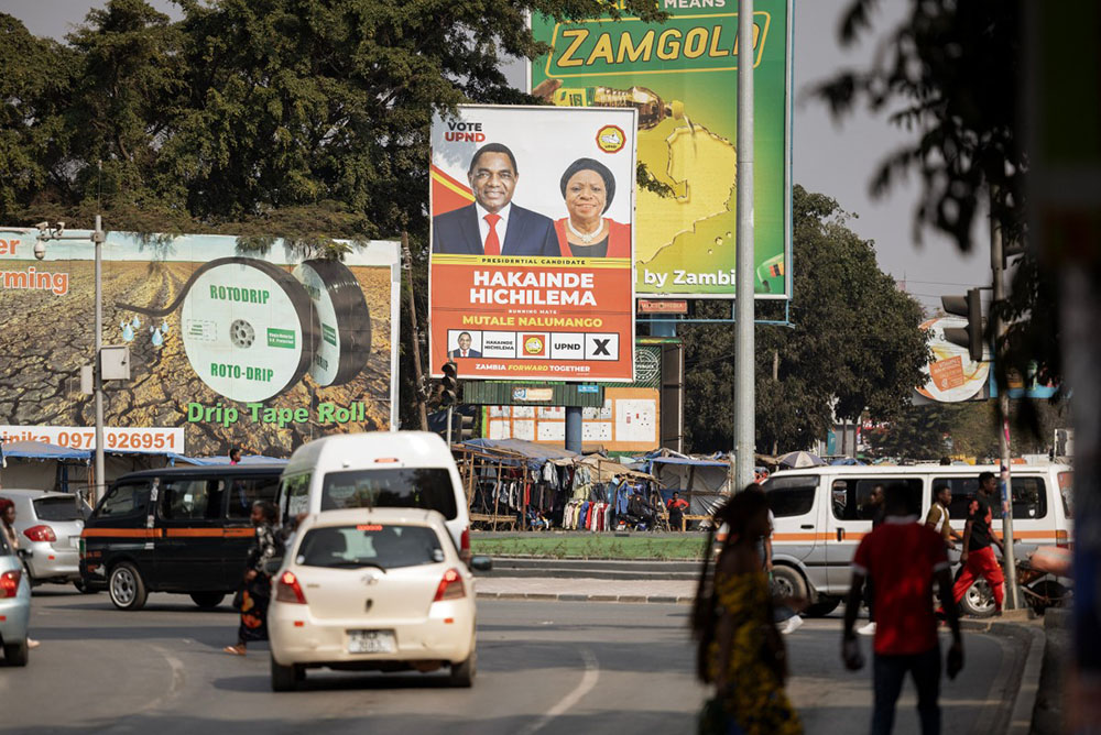A presidential campaign billboard of Zambian incumbent president Hakainde Hichilema is seen by a roundabout in Lusaka, on August 9, 2026. (Credit: AFP)