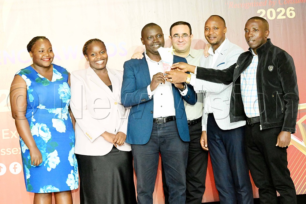 The Bethany Women and Family Hospital team displays the accolade they received after being recognised among the best-performing companies and organisations at the second annual Business Excellence Awards on August 14, 2026. (Photo by Eddie Ssejjoba)