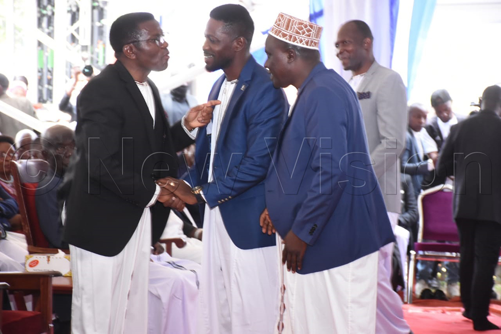 Katikkiro Charles Peter Mayiga greeting Robert Kyagulanyi. 