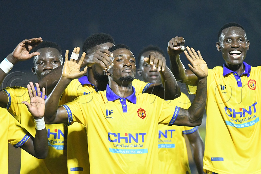 KCCA FC's Ivan Ahimbisibwe (center) is joined by teammates in celebration after scoring against his former side URA during a Uganda Premier League match at the Phillip Omondi Stadium, November 21, 2025. KCCA won 2-1. (Credit: Michael Nsubuga)