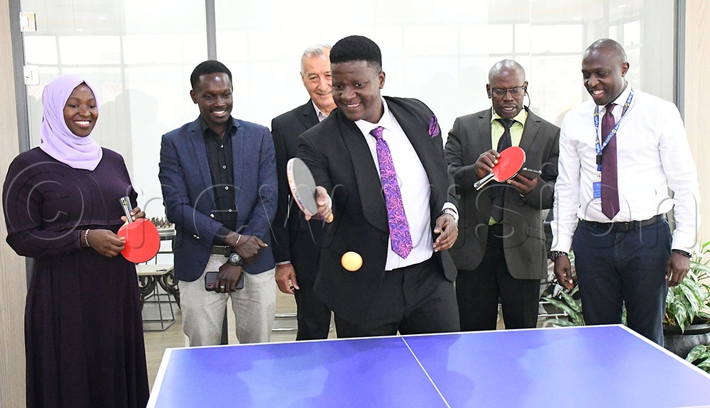 DStar Foundation president Daniel Ssekyanzi returns the ball as Amina Lukaaya, Masseto, Sseruryo, and City Tyres Herbert Bashasha look at the MAZ offices, November 18, 2025. (Credit: Michael Nsubuga)