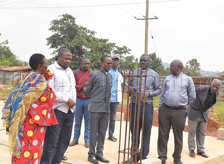 Rev. Merewooma Ng'alaga Rev. Kimmanje Pulojekiti Y'ekizimbe Gy'alese Ng'evudde Ku Musingi 2