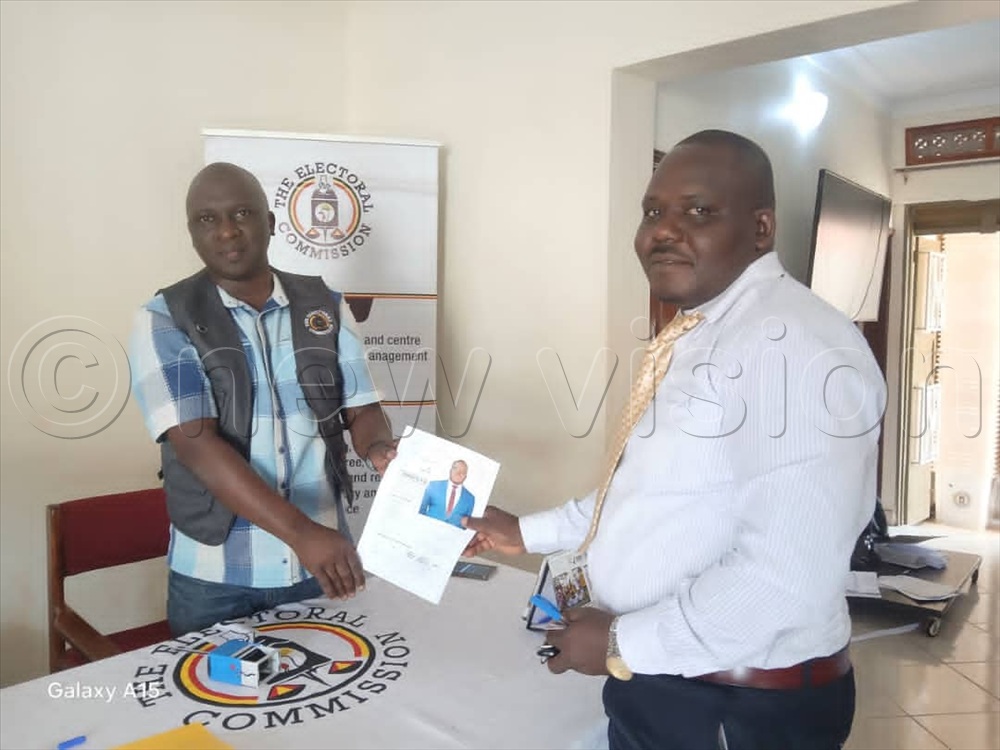 Moses Kiirya (right), the district speaker, after being nominated.