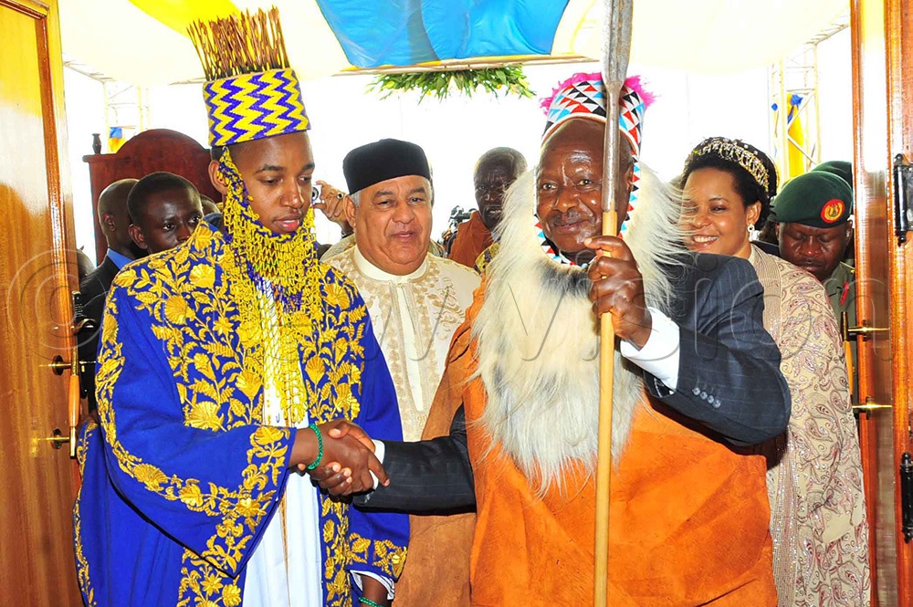 L-R: Omukama Oyo, Libyan Ambassador to Uganda Abdalla Bujeldain, President Museveni and Queen Mother Best Kemigisha officially opening King's Palace which was Renovated by Libyan Leader Muammar Gaddafi on 17/4/2010. (New Vision Archives)