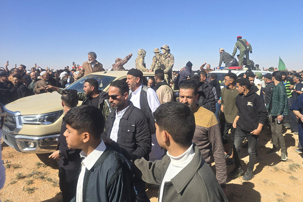 Libyans gather for the funeral of Seif al-Islam Gaddafi, the son of Libya's late longtime ruler, in Bani Walid, in the Tripoli region, western Libya on February 6, 2026. (AFP)