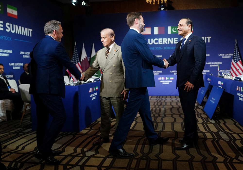 US Vice President JD Vance (2ndR), US President's special envoy Steve Witkoff (L), Pakistan's Prime Minister Shehbaz Sharif (2ndL) and Pakistan's Chief of Army Staff Field Marshal Asim Munir shake hands ahead of a quadrilateral meeting between the United States, Iran, Pakistan and Qatar at the Burgenstock luxury hotel complex overlooking Lake Lucerne, Switzerland, on June 21, 2026, as part of high-level talks aimed at advancing a deal to end the Middle East conflict. (Credit: AFP)