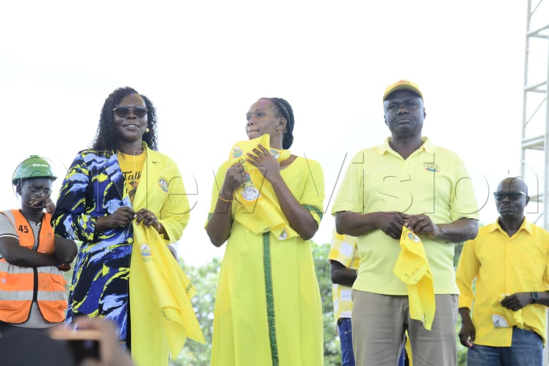 Minister of State Privatization and Investment. Hon. Evelyn Anite, Hon. Phiona Nyamutoro, Minister of State for Energy and Mineral Development (Minerals) on stage at the rally.