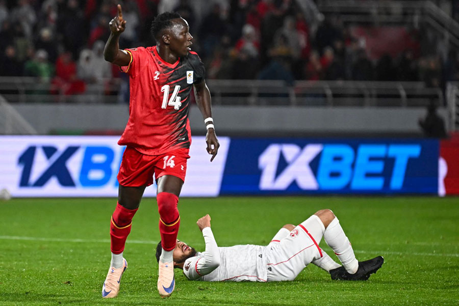 Uganda's forward #14 Denis Omedi celebrates his goal during the Africa Cup of Nations (CAN) Group C football match between Tunisia and Uganda at Rabat Olympic Stadium in Rabat. AFP PHOTO